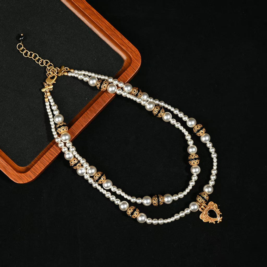 Midnight Crest Layered Pearl Necklace